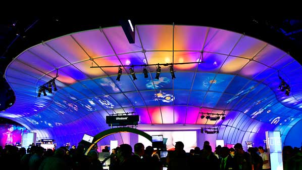 attendees stand underneath the canopy of the immersive interactive environment at CES