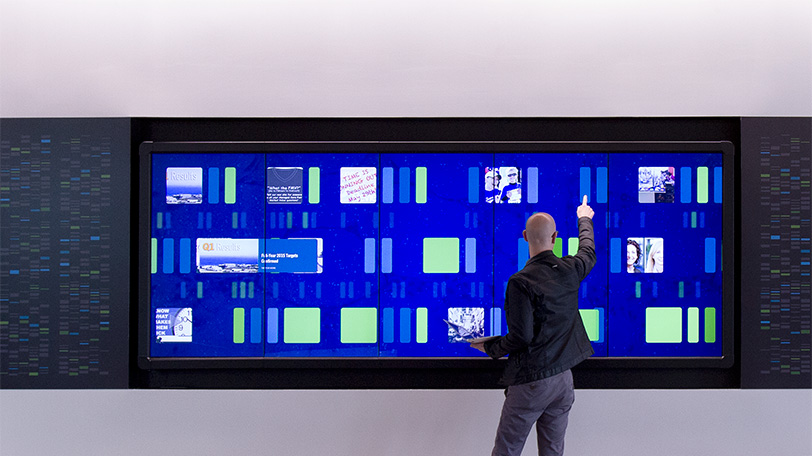 user interacts with touch wall